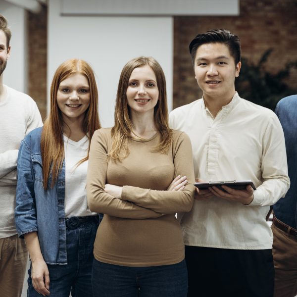 business-people-posing-together-office